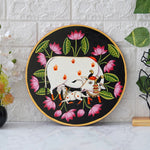 Load image into Gallery viewer, This beautiful pichwai painting features the Hindu deity Krishna cradling his beloved calf, surrounded by a vibrant array of flowers.