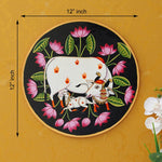 Load image into Gallery viewer, This beautiful pichwai painting features the Hindu deity Krishna cradling his beloved calf, surrounded by a vibrant array of flowers.