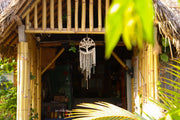 Bamboo structure with a dreamcatcher hanging